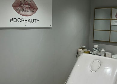 Elegant treatment room at HB Aesthetics # DC Beauty, Sutton, England, GB with stylish decor and modern amenities.