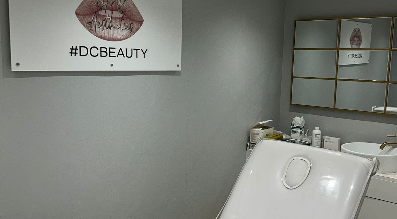 Elegant treatment room at HB Aesthetics # DC Beauty, Sutton, England, GB with stylish decor and modern amenities.