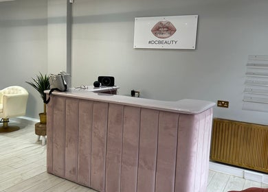 Elegant HB Aesthetics # DC Beauty reception in Sutton, England, GB showcasing stylish decor and branding.
