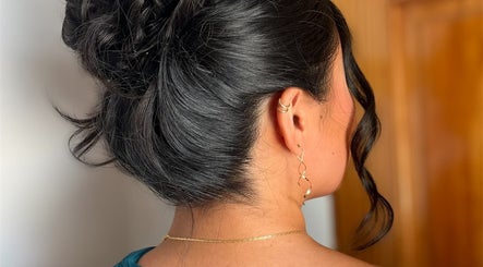 Elegant updo hairstyle created by Hair by Micaela Rae, East Meadow, New York, US.