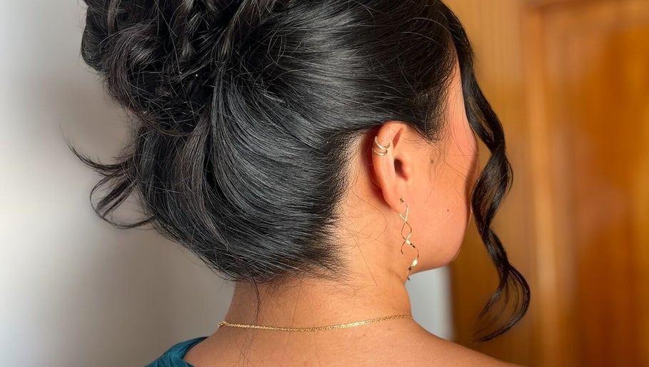 Elegant updo hairstyle at Hair by Micaela Rae, East Meadow, New York, US offering professional styling.