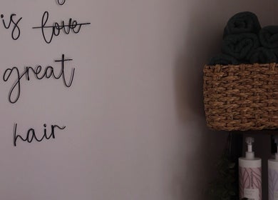 Stylish salon wall and products at Bethany Karol Hair & Nail Artistry, Bury St Edmunds, England, GB.