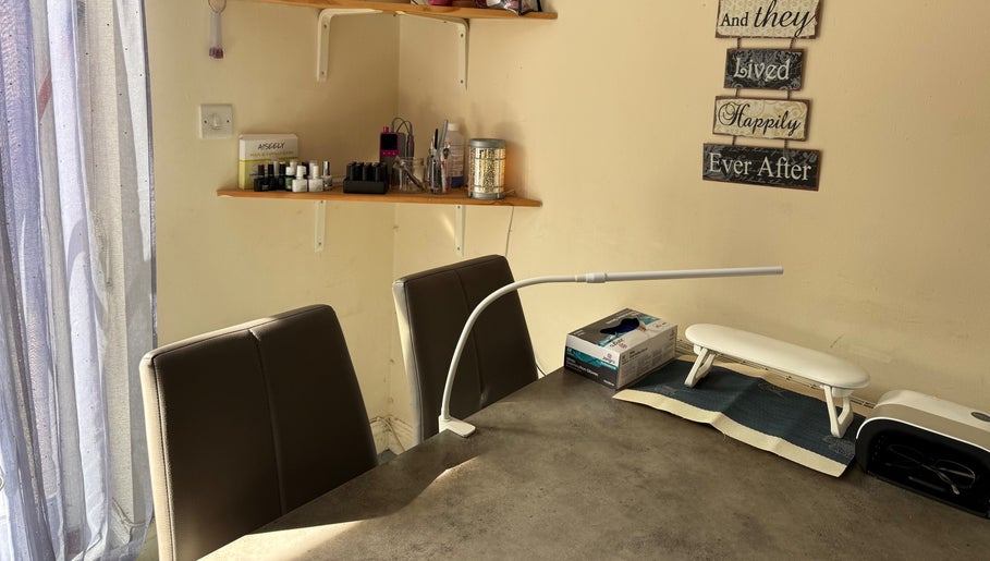 Sha-Nails beauty workstation in Ramsey, GB with manicure tools and cozy decor for a relaxing experience.