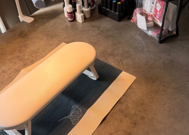 Comfortable nail station setup at Sha-Nails in Ramsey, GB with manicure tools displayed on a desk.