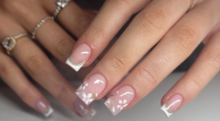 Delicate floral nail art from Rach Nails in West Parley, England, GB showcases exquisite beauty.