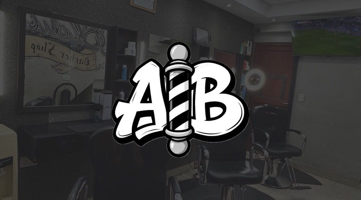 Interior de Aldito Barber en Buenos Aires, Ciudad Autónoma De Buenos Aires, AR, con sillas y decoración moderna.