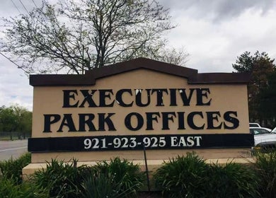 Entrance sign for office park near Chinese Massage Oasis, Salt Lake City, Utah, US.