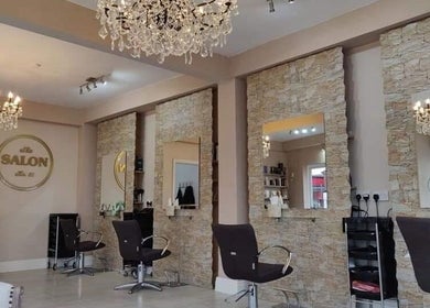 Luxurious salon interior at HBL LONGRIDGE in Longridge, England, GB with ornate chandeliers and stylish chairs.