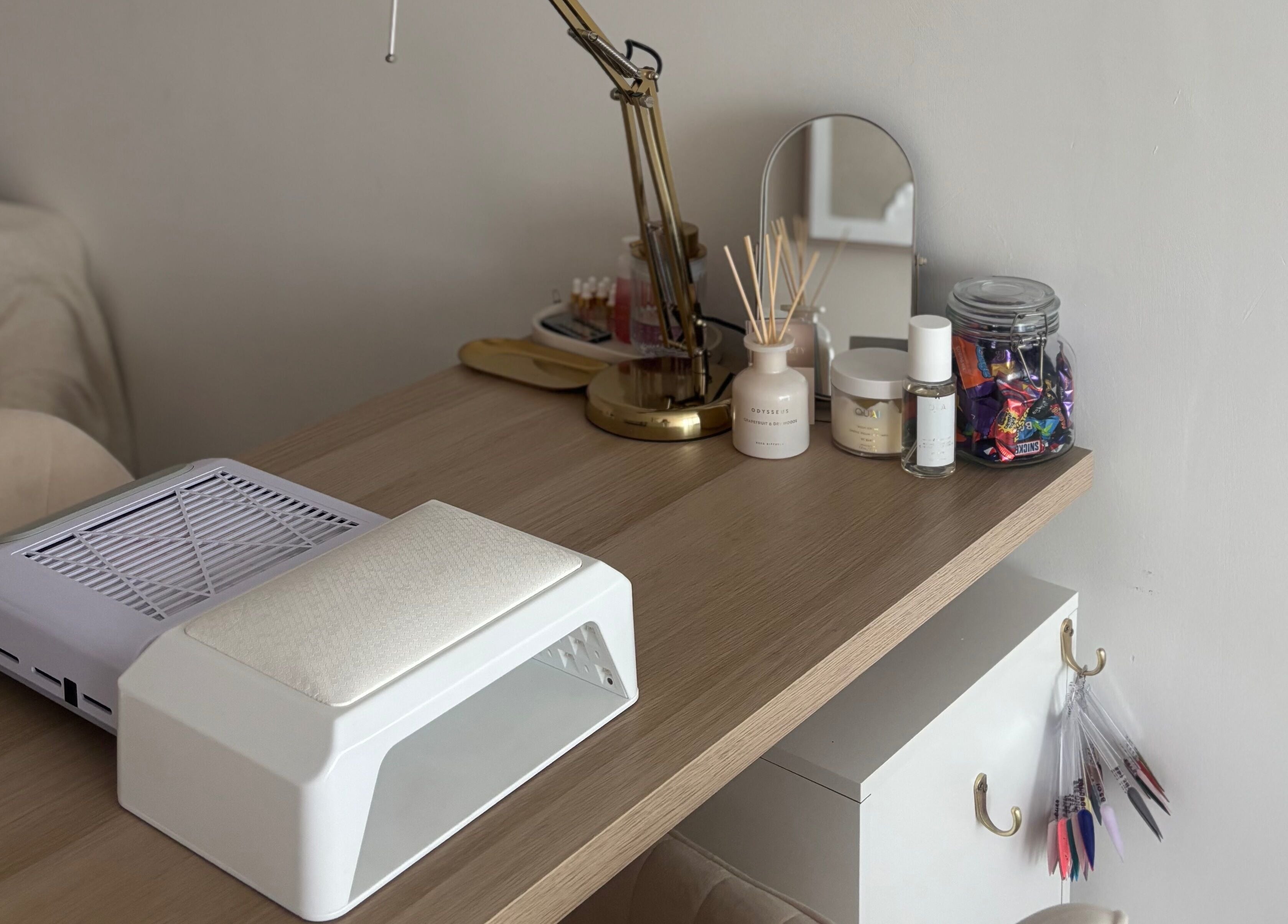 THE NAIL SOCIETY BY ANITA's sleek nail station in Rochester, England, GB with organized tools and stylish decor.