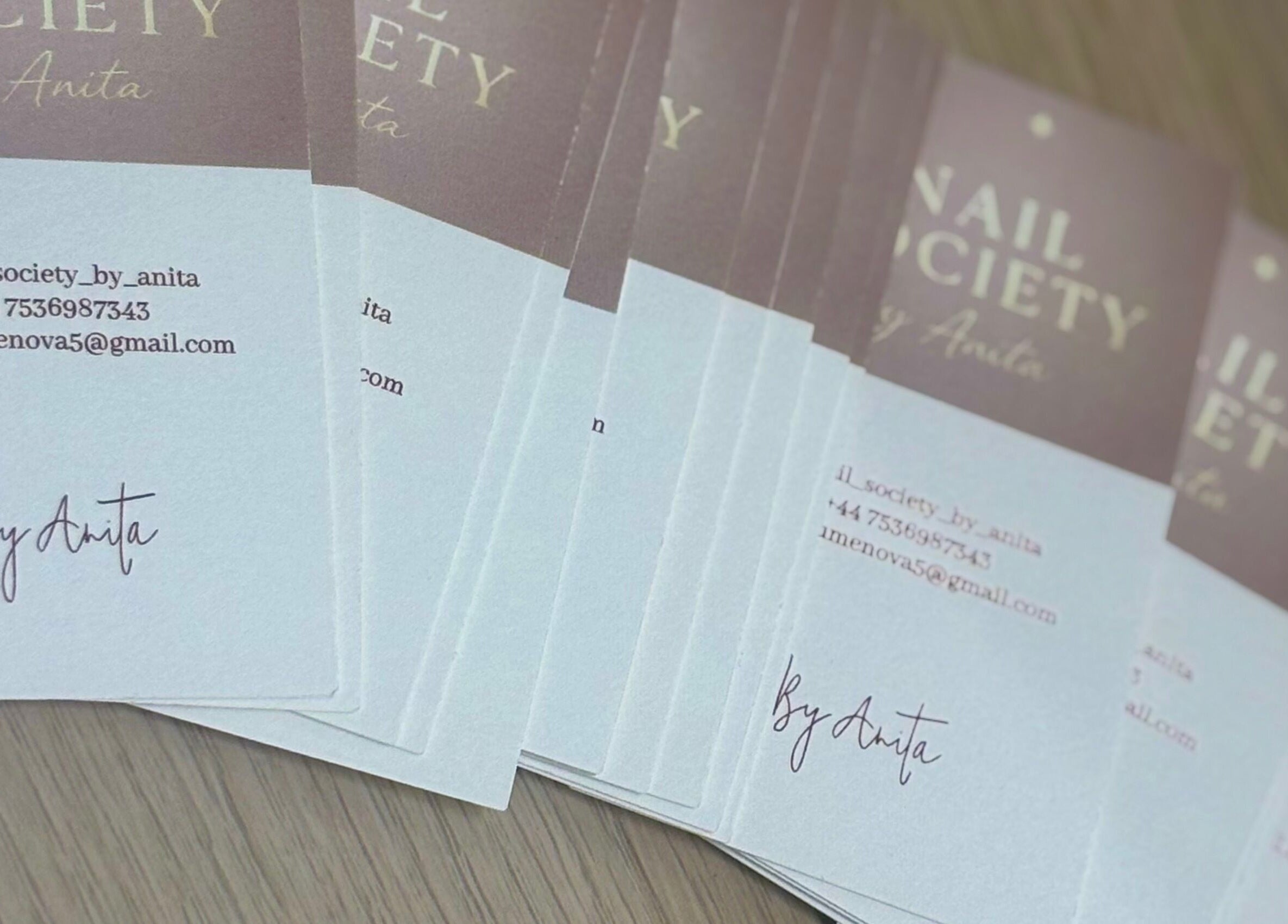 Business cards for THE NAIL SOCIETY BY ANITA, Rochester, England, GB, showcasing contact information.