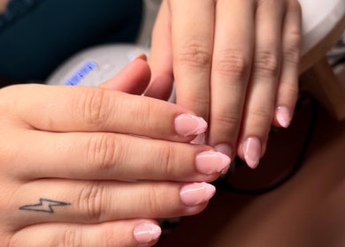 Beautifully manicured nails at Nomad Nail Studio, Maryborough, Queensland, AU. Soft pink polish glows.