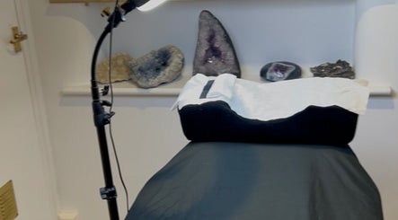Cozy treatment bed at Blinx by Larisa, Stratford-upon-Avon, England, GB, with soothing decor and lighting.