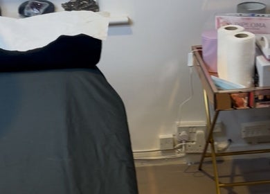 Treatment bed and supplies at Blinx by Larisa, Stratford-upon-Avon, England, GB.