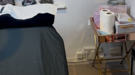 Treatment bed and supplies at Blinx by Larisa, Stratford-upon-Avon, England, GB.
