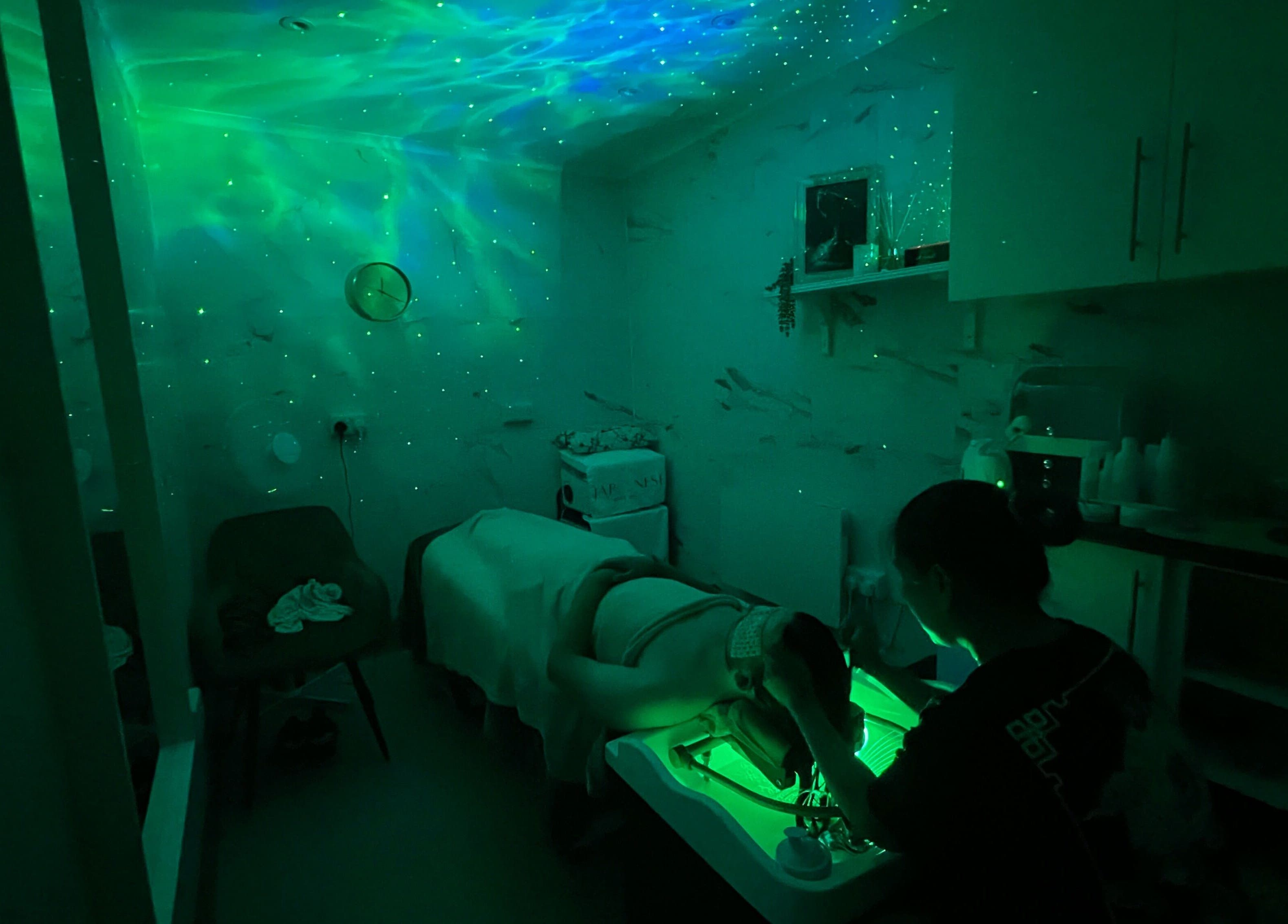 Soothing green-lit room at Japanese Head Spa & Relaxing Massage by Jac, Southampton, England, GB.