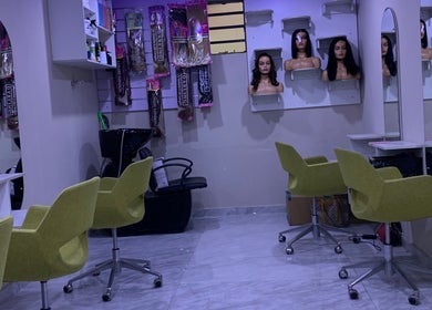 Modern salon chairs and styling stations at Wendys Beauty Arena, Johannesburg, Gauteng, ZA.