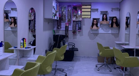 Wendys Beauty Arena in Johannesburg features chic salon chairs and wig displays.