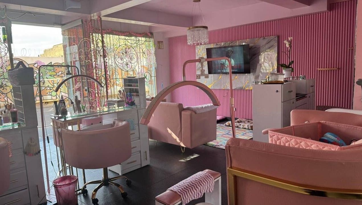 Luxurious pink interior of Bloom Velvet Spa S.A.S in Bogotá, D.c., offering a chic wellness experience.