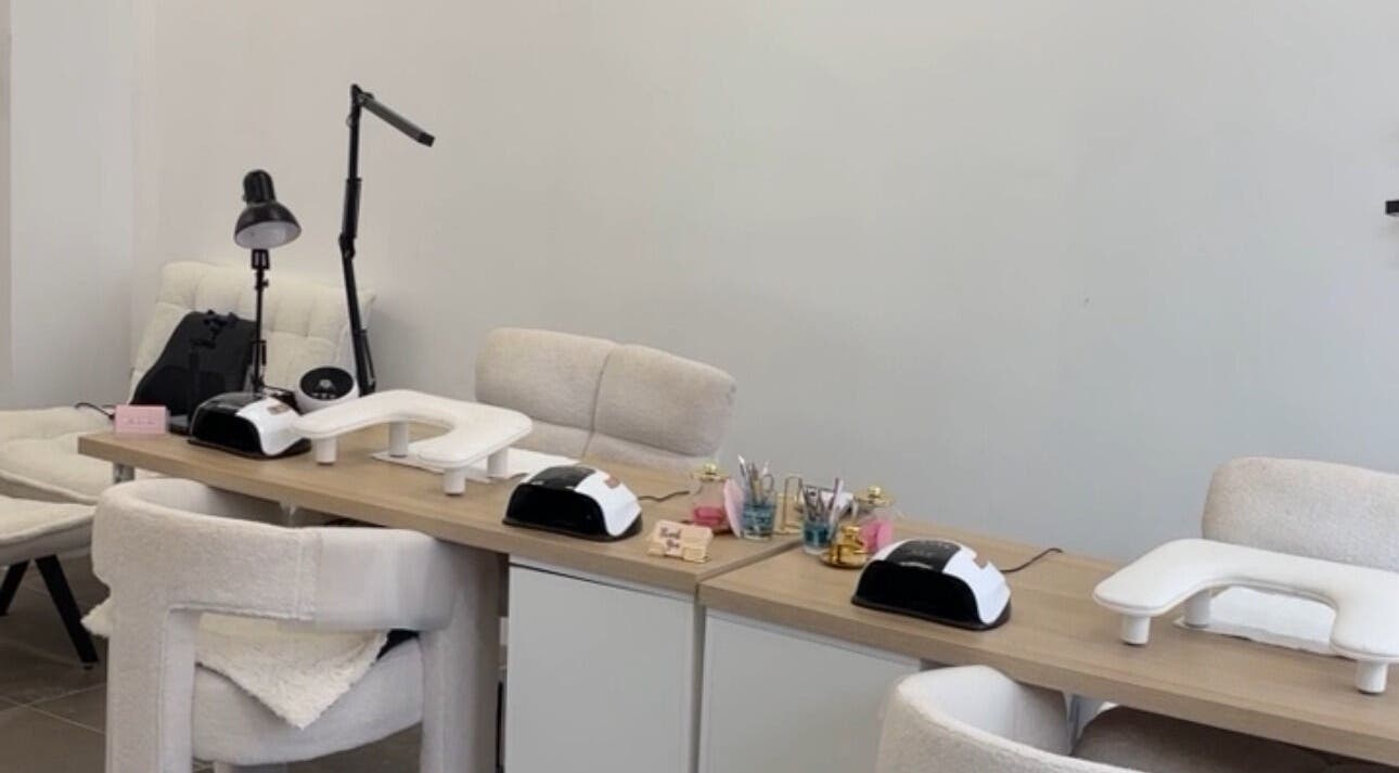 Spacious nail treatment area at Beauty_bymeg5 in Maryport, England, GB, featuring modern chairs and equipment.