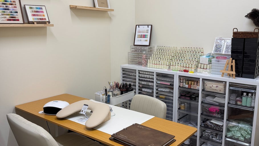 Modern nail art station at One Drop Studio, Arcadia, California, US, showcasing polish and design tools.