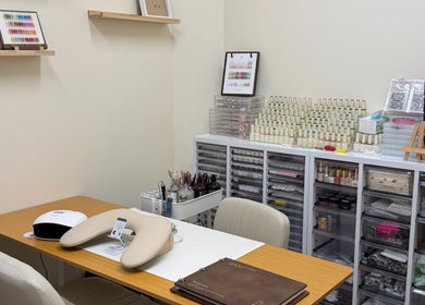 Modern nail art station at One Drop Studio, Arcadia, California, US, showcasing polish and design tools.