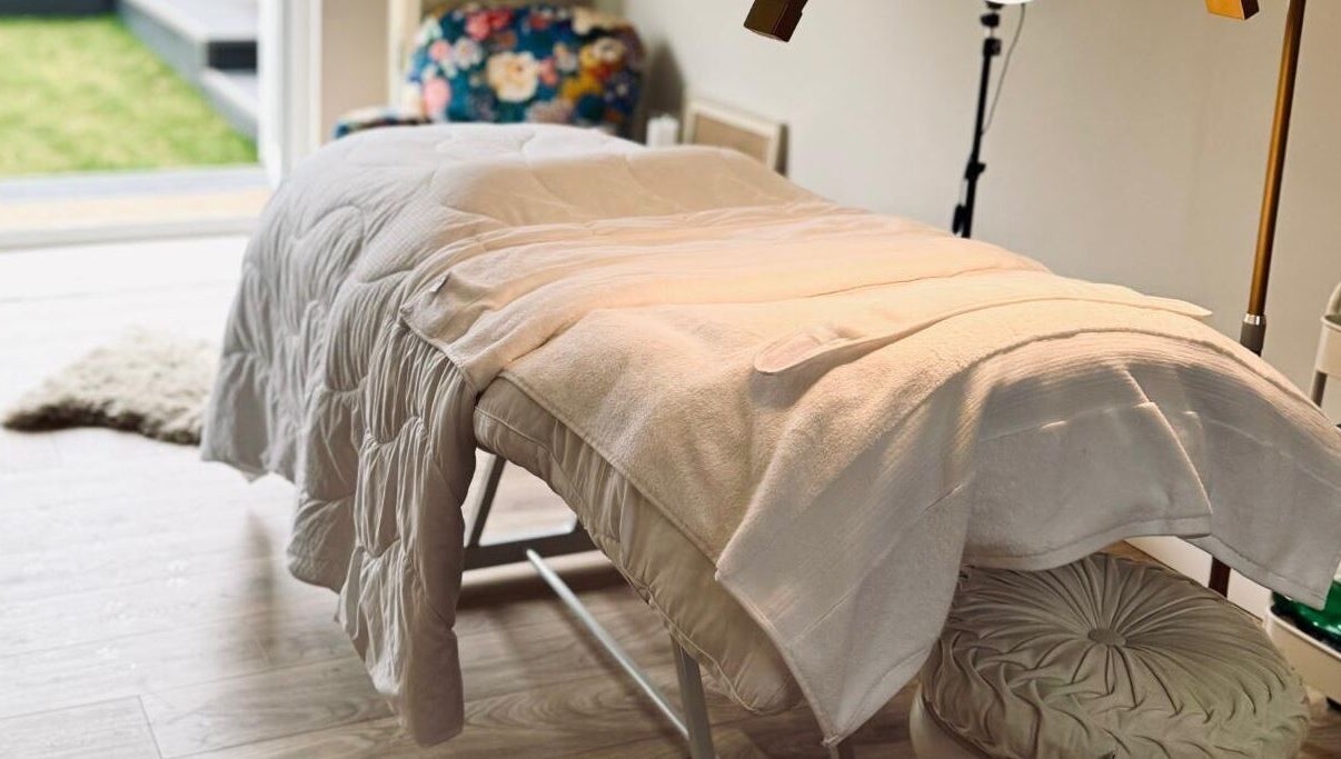 Massage bed at Kalma, Braintree, England, GB offering a serene wellness experience.