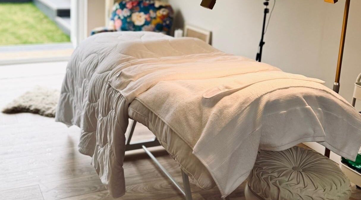 Massage bed at Kalma, Braintree, England, GB offering a serene wellness experience.