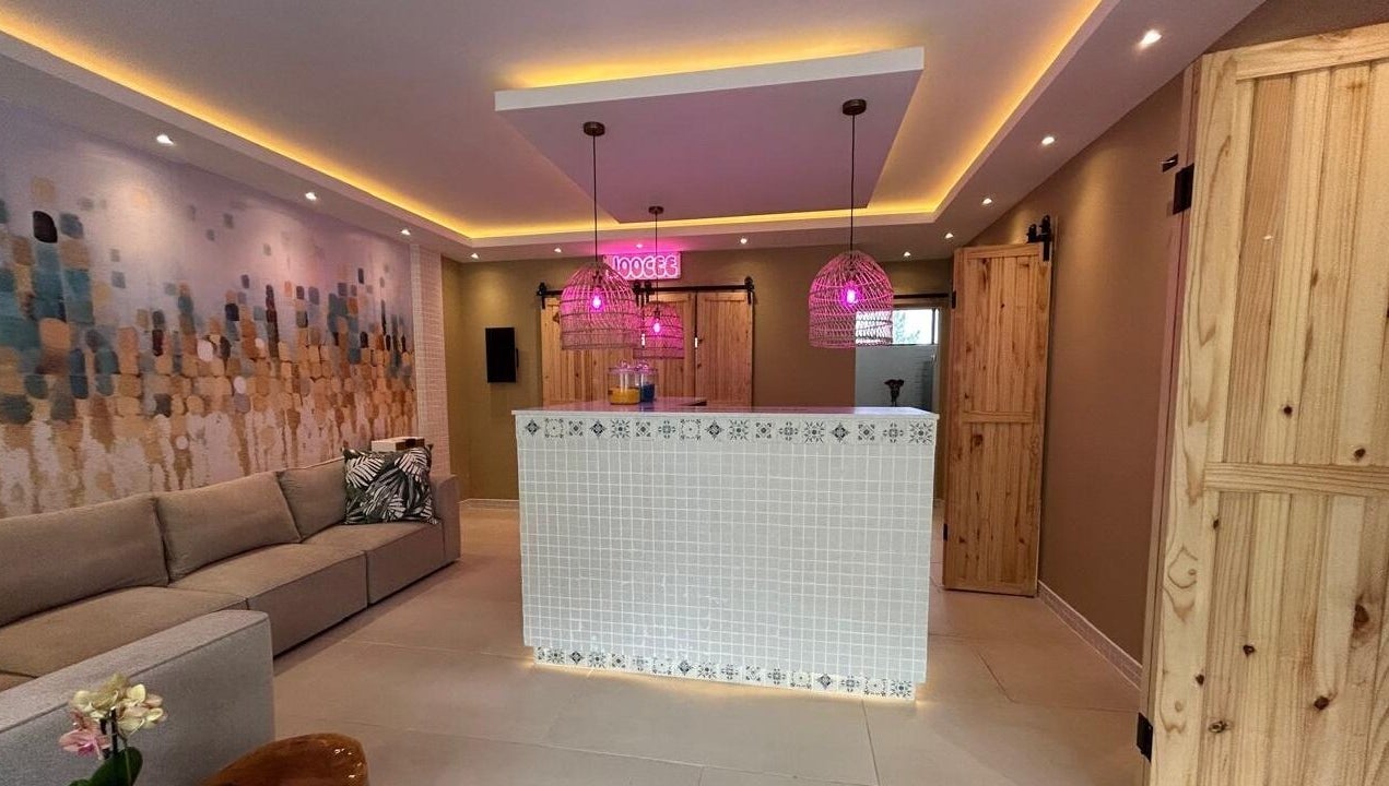 Welcoming lobby of MorrowMed in Ballito, Kwazulu-Natal, ZA, with modern decor and vibrant lighting.