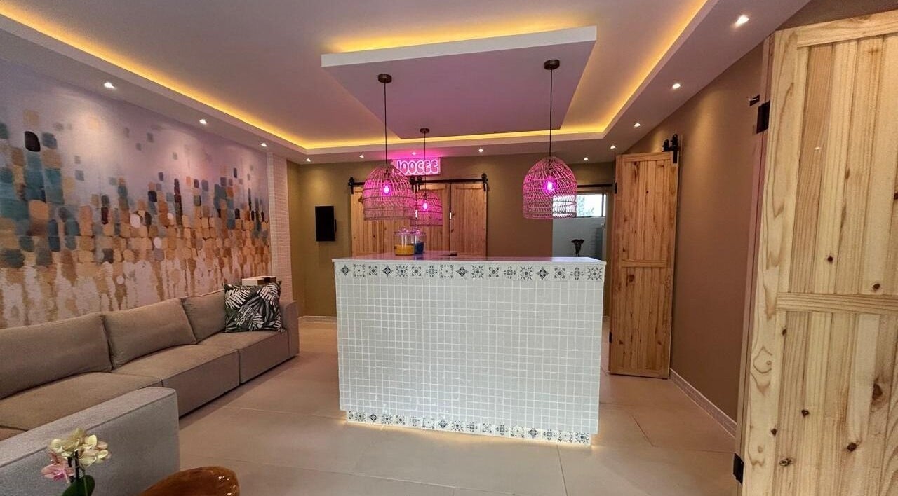 Welcoming lobby of MorrowMed in Ballito, Kwazulu-Natal, ZA, with modern decor and vibrant lighting.