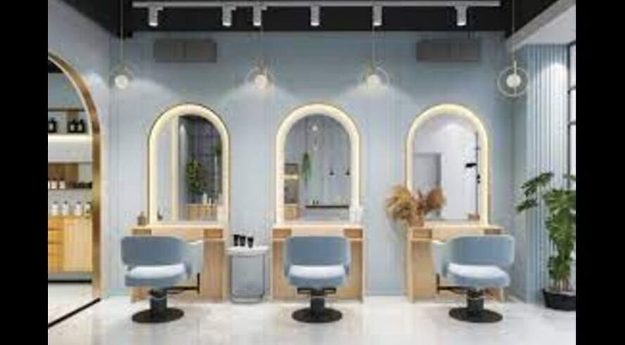 Modern salon interior at Beauty Tech, Tehran, Tehran Province, IR with stylish seating and large mirrors.