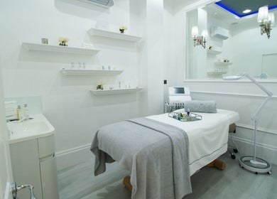 Sleek treatment room at Oxy Spa LTD, London, England, GB with modern decor and comfortable ambience.