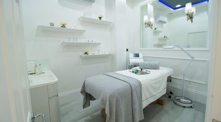 Sleek treatment room at Oxy Spa LTD, London, England, GB with modern decor and comfortable ambience.