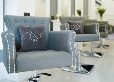 Modern spa chairs at Oxy Spa LTD, London, England, GB. Experience luxury and comfort in a stylish setting.