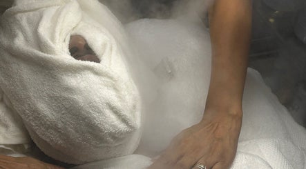 Facial steam therapy at Luxe Mere’, London, England, GB, promoting relaxation and rejuvenation.