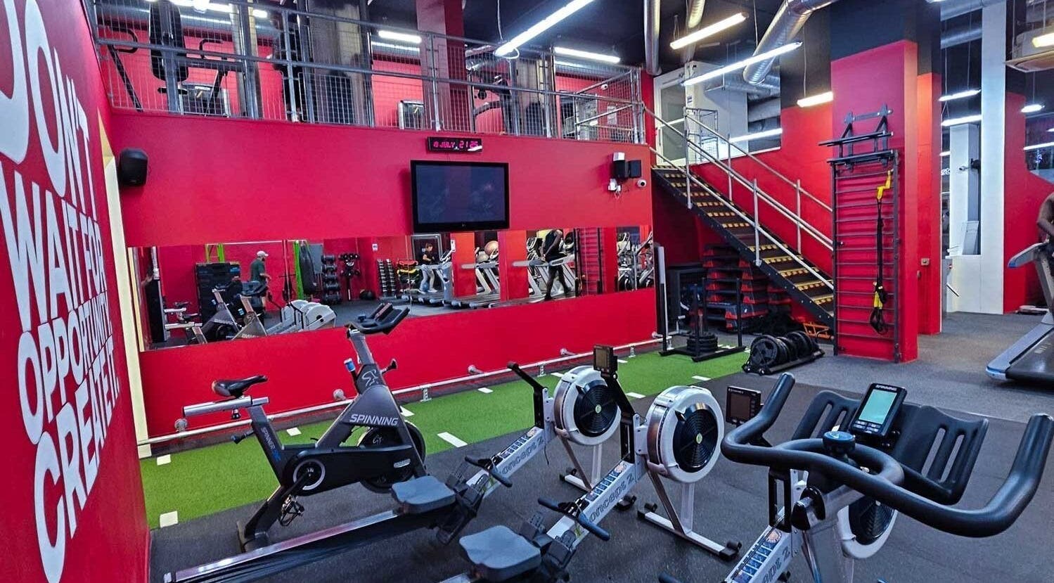 State-of-the-art gym equipment at Wembley Fitness, Wembley, England, GB. Modern workout ambiance.