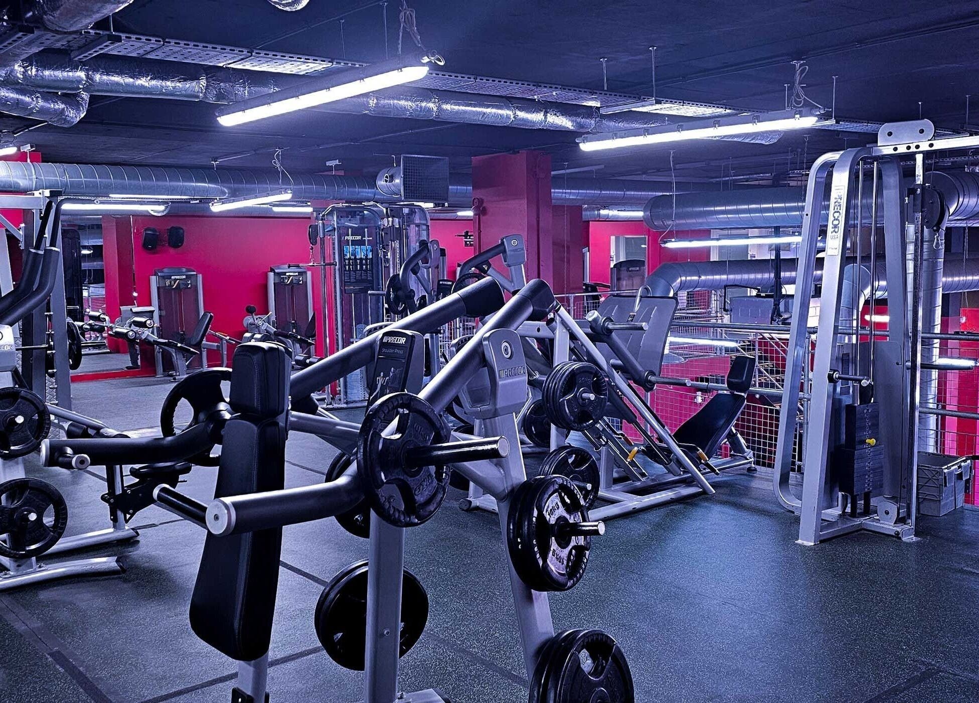 Modern gym equipment at Wembley Fitness, located in Wembley, England, GB, focused on weight training and fitness.