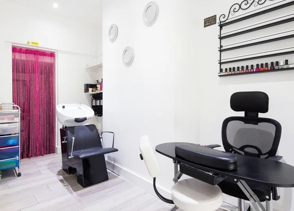 Modern salon nook at The Beauty Bar Wembley, Wembley, England, GB with sleek design and seating.