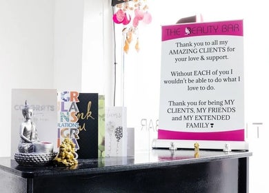 Gratitude cards and sign at The Beauty Bar Wembley, England, GB, showcasing client appreciation.