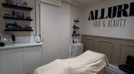 Elegant treatment room at Freyasbeautybar in Caterham, England, GB, with modern decor and beauty products displayed.