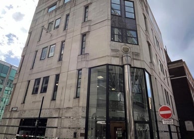 Exterior view of Jolie Hairdressing in a modern building, located in London, England, GB.