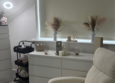 Relaxing space at Ab.aesthetics, Clifton Upon Dunsmore, England, GB showcasing elegant decor and soft lighting.