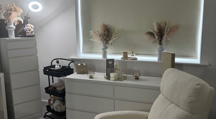 Relaxing space at Ab.aesthetics, Clifton Upon Dunsmore, England, GB showcasing elegant decor and soft lighting.