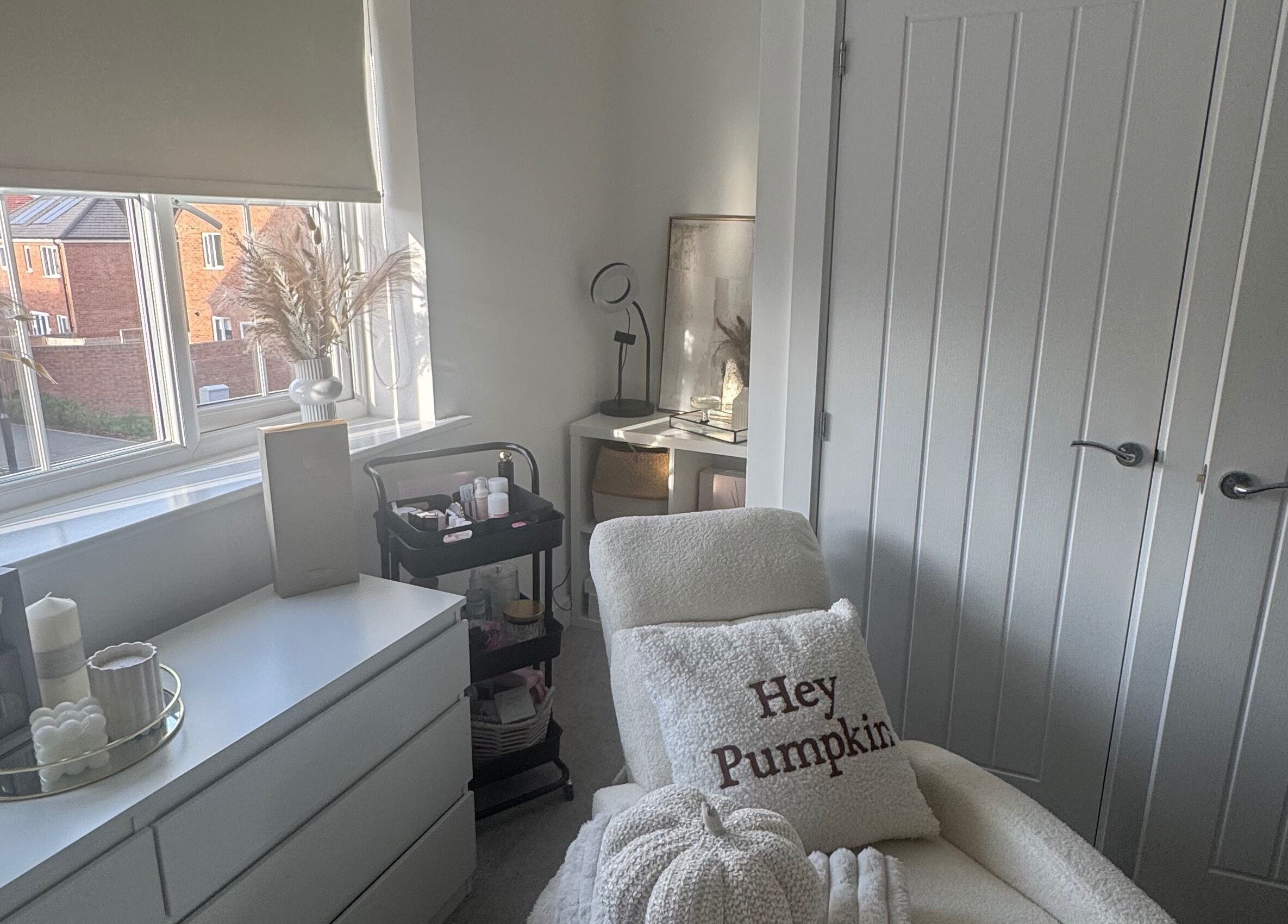 Elegant treatment room at Ab.aesthetics, Clifton Upon Dunsmore, England, with plush chair and stylish decor.