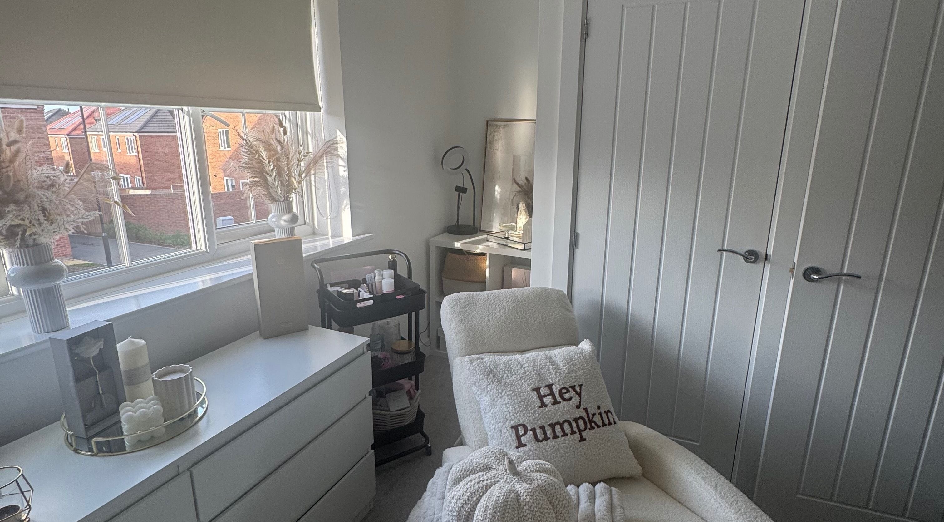 Elegant treatment room at Ab.aesthetics, Clifton Upon Dunsmore, England, with plush chair and stylish decor.