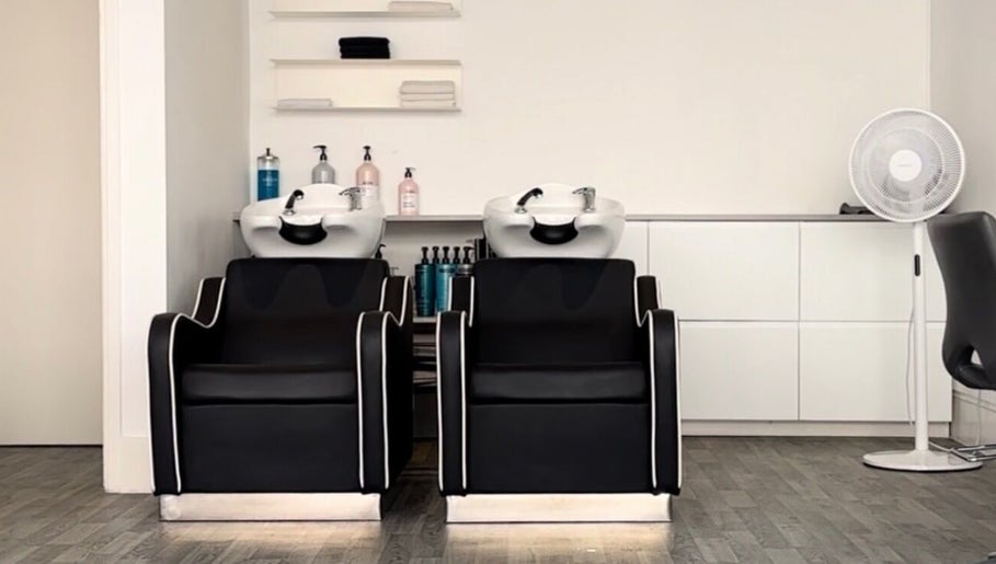 Chic hair wash stations at Beloved Locks Hair, Alton, England, GB, offering relaxation and style.