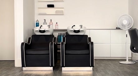 Chic hair wash stations at Beloved Locks Hair, Alton, England, GB, offering relaxation and style.