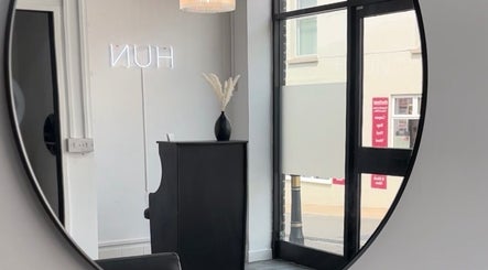 Elegant interior with modern decor at Beloved Locks Hair in Alton, England, GB.