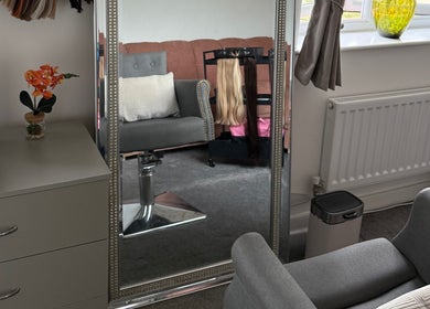 Cozy interior of Beloved Locks Hair - Hook Salon, Hook, England, GB, featuring a large ornate mirror and styling chair.