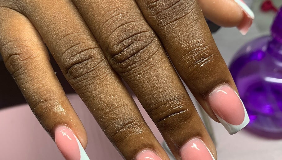 Elegant French manicure at La Luz Beauty Studio, Saint Michael, Saint Michael, BB. Pink polish with white tips.
