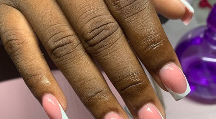 Elegant French manicure at La Luz Beauty Studio, Saint Michael, Saint Michael, BB. Pink polish with white tips.